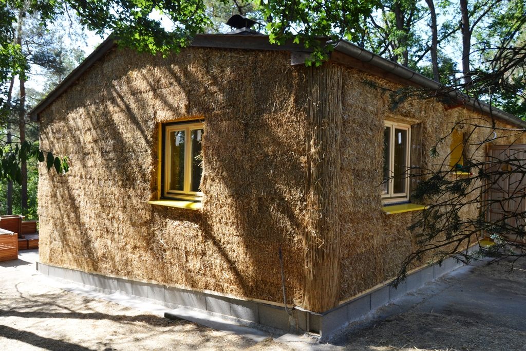 Straw Bale Wrapping in Plank