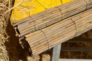 Straw Bale Wrapping in Plank