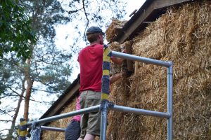 Straw Bale Wrapping in Plank