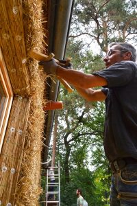 Straw Bale Wrapping in Plank