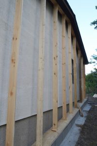 Straw Bale Wrapping in Plank