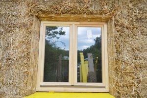 Straw Bale Wrapping in Plank