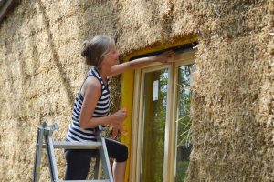 Straw Bale Wrapping in Plank