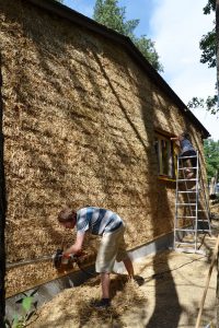 Straw Bale Wrapping in Plank