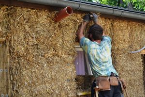 Straw Bale Wrapping in Plank