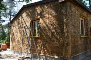 Straw Bale Wrapping in Plank