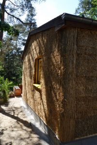 Straw Bale Wrapping in Plank