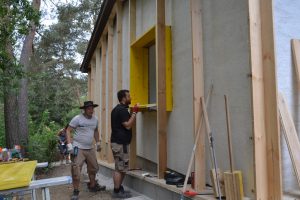 Straw Bale Wrapping in Plank