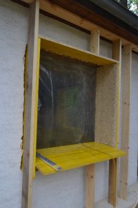 Straw Bale Wrapping in Plank