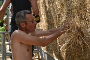 Straw Bale Wrapping in Plank