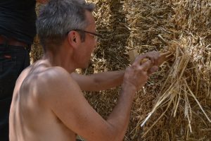 Straw Bale Wrapping in Plank