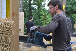 Straw Bale Wrapping in Plank