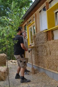 Straw Bale Wrapping in Plank